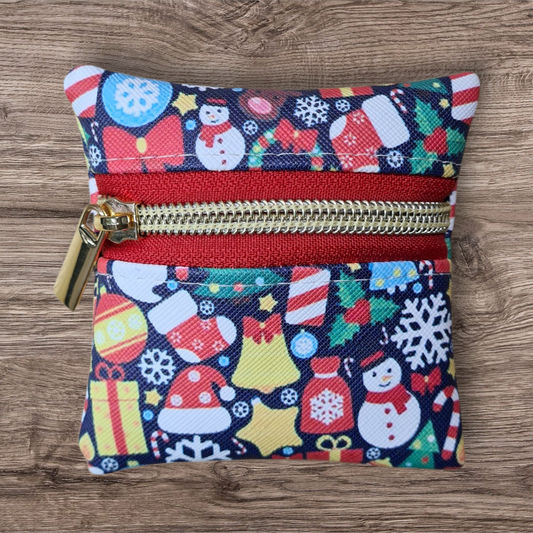 Christmas symbols on Navy Petite pouch