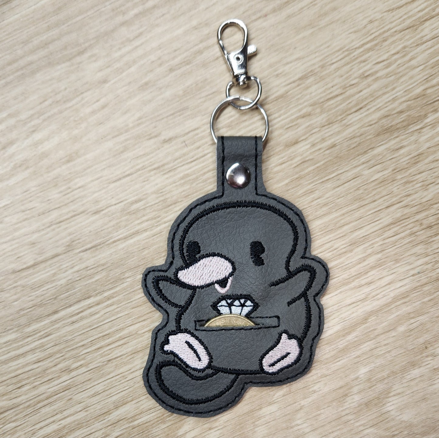 Magic creature coin keeper